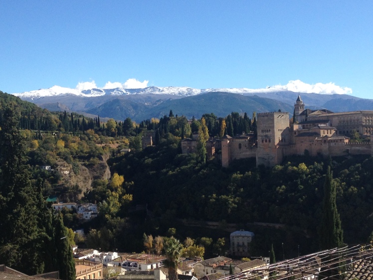 The Alhambra Palace with the Sierra Nevada Mountains as a backdrop